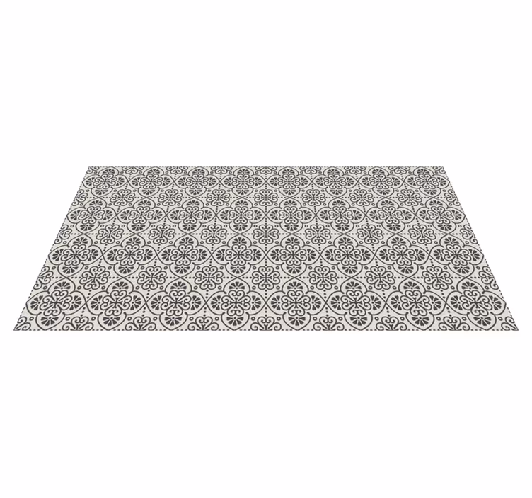 Kakelmatta i beige och svart blomma - Tenstickers