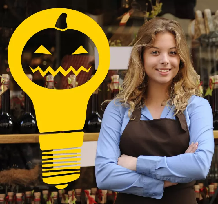 En skalle i en glödlampa halloween klistermärke - Tenstickers