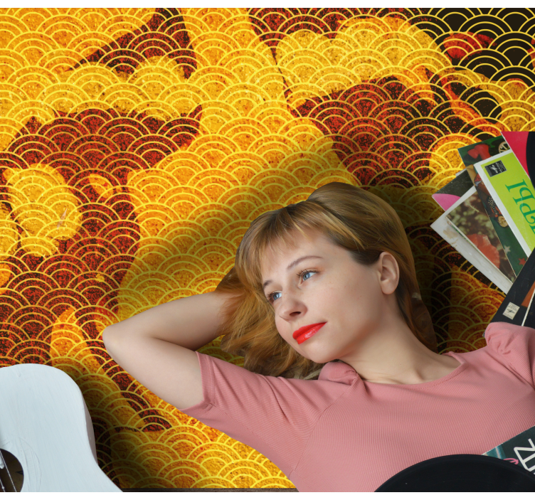 Elegant vardagsrumsmatta i guldstruktur - Tenstickers